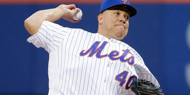 FILE- In this May 18, 2016, file photo, New York Mets' Bartolo Colon delivers a pitch during the first inning of a baseball game against the Washington Nationals in New York. Colon turns 43 on Tuesday, May 24, 2016. (AP Photo/Frank Franklin II, File)