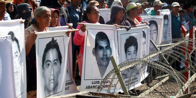 Relatives of missing students protest in Iguala, Mexico, on Dec. 18, 2014.
