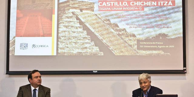 Rene Chavez, right, researcher at the Institute of Geophysics of the National Autonomous University of Mexico, (UNAM), speaks next to Arturo Iglesias, director of the Institute, during a press conference in Mexico City, Thursday, Aug. 13, 2015. Researchers at the UNAM found that the Kukulcan pyramid in the archaeological site of Chichen Itza is built on a cenote or a water filled sinkhole. (AP Photo/Esteban Felix)