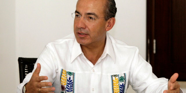 Mexico's President Felipe Calderon speaks during an interview with The Associated Press in Cancun, Mexico, Monday Nov. 29, 2010. Calderon is in Cancun to attend the United Nations Climate Change Conference, the first full U.N. meeting since the letdown last December of the Copenhagen summit.