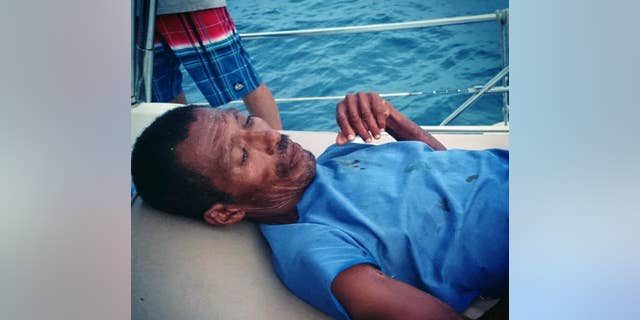 In this Monday, Sept. 22, 2014 photo courtesy of Adonai Vazquez, Mexican fisherman Raymundo Rodriguez, who had been adrift at sea for a week, rests on a boat after he was rescued off the coast of Mexico. Rodriguez was rescued by people aboard a Mexican pleasure boat after his fishing boat was swamped by Tropical Storm Polo. Crew members found the exhausted man as he floated in a giant foam cooler about 6 miles (10 kilometers) off Acapulco. Rodriguez said his fishing companion Mario Morales died farther out to sea. (AP Photo/Courtesy of Adonai Vazquez)