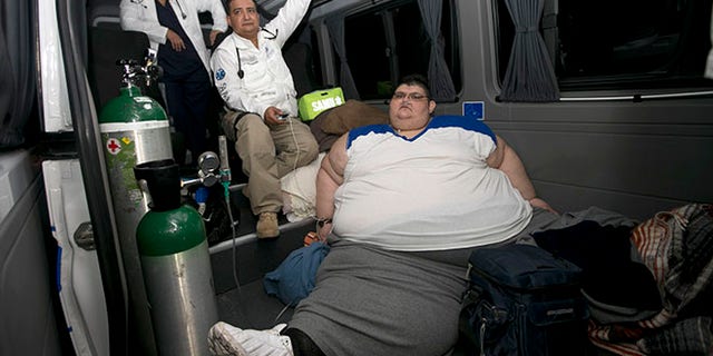 Juan Pedro is taken care of by paramedics on arrival at hospital in Guadalajara, Mexico, Tuesday, Nov. 15, 2016. Juan Pedro,who weighs about 1,100 pounds (500 kilos) and hasn't left his bed in six years has been removed by medical personnel for treatment. His doctor gave the man's name only as Juan Pedro, 32, from the central city of Aguascalientes. (AP Photo/Refugio Ruiz)