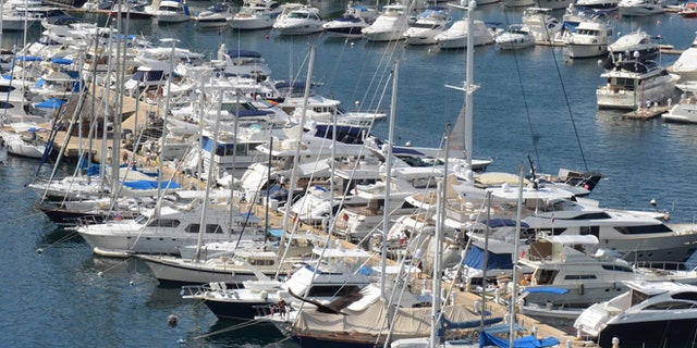 In this Tuesday,  Jan. 7, 2014 photo, yachts are docked at a marina in the Bay of Acapulco, Mexico. After inspecting more than 1,600 vessels in late November, the Mexican governmentâs Treasury Department announced it had initiated seizure orders against hundreds of foreign boats it accused of lacking a temporary import permit which proves that the holders own their boats and promise not to leave them in Mexico or sell them here. Many boat owners say they simply werenât around when authorities came by and slapped liens on the boats barring them from leaving Mexico, and say officials have not told them how they could remedy the situation.  Foreign pleasure boat owners call this a heavy-handed crackdown over a minor permit, and they say it threatens a tourism sector Mexico has long sought to promote. (AP Photo/Bernandino Hernandez)