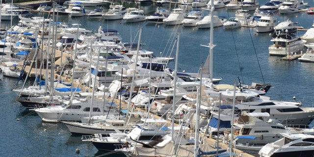 In this Tuesday, Jan. 7, 2014 photo, yachts are docked at a marina in the Bay of Acapulco, Mexico. After inspecting more than 1,600 vessels in late November, the Mexican governmentâs Treasury Department announced it had initiated seizure orders against hundreds of foreign boats it accused of lacking a temporary import permit which proves that the holders own their boats and promise not to leave them in Mexico or sell them here. Many boat owners say they simply werenât around when authorities came by and slapped liens on the boats barring them from leaving Mexico, and say officials have not told them how they could remedy the situation. Foreign pleasure boat owners call this a heavy-handed crackdown over a minor permit, and they say it threatens a tourism sector Mexico has long sought to promote. (AP Photo/Bernandino Hernandez)