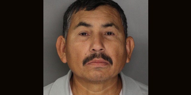 In this handout photo released by the Sacramento County Sheriff's Department is  Genaro Olaguez, who was arrested and sent back to Mexico on allegations that he killed eight government officials in Mexico.  Olaquez was arrested in Sacramento, Calif., Tuesday, Dec. 3, 2013, in connection with  the May 2, 2000, murders of a commissioner and seven other city officials in Sinaloa, Mexico.(AP Photo/Sacramento County Sheriff's Department)