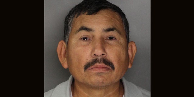 In this handout photo released by the Sacramento County Sheriff's Department is Genaro Olaguez, who was arrested and sent back to Mexico on allegations that he killed eight government officials in Mexico. Olaquez was arrested in Sacramento, Calif., Tuesday, Dec. 3, 2013, in connection with the May 2, 2000, murders of a commissioner and seven other city officials in Sinaloa, Mexico.(AP Photo/Sacramento County Sheriff's Department)