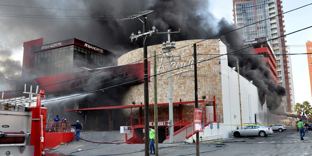 Aug. 25: Smoke billows from the Casino Royale in Monterrey, Mexico.