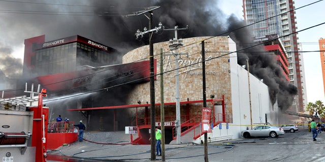 Aug. 25: Smoke billows from the Casino Royale in Monterrey, Mexico.