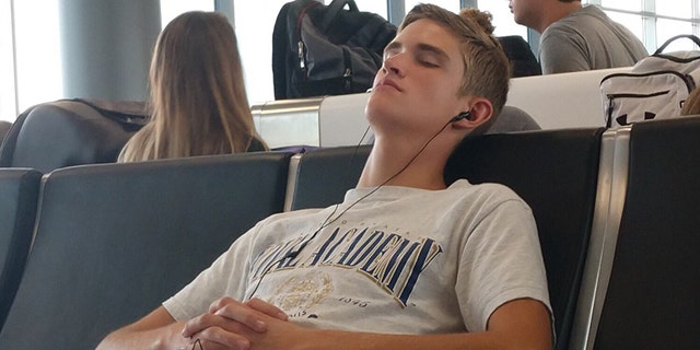 The teens could not book another flight until the next day.