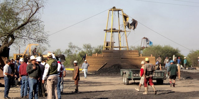 May 3: People wait outside a coal mine in San Juan de Sabinas, in the Mexican state of Coahuila.