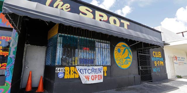 The Spot, a club in Miami, Fla., where at least 15 people were wounded in a shooting early Sunday, Sept. 28, 2014, police said. Miami police said gunfire erupted around 1 a.m. Sunday at the club. It’s unclear how many shooters there were and what caused the shooting. (AP Photo/Alan Diaz)