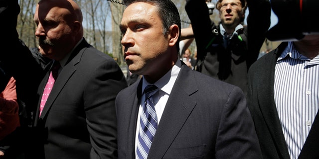 U.S. Rep. Michael Grimm leaves federal court in New York, Monday, April 28, 2014. Grimm was taken into custody Monday to face federal charges following a two-year investigation of his campaign financing. (AP Photo/Seth Wenig)