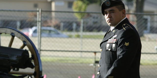 In this Oct. 31, 2011 file photo, U.S. Army Spc. Michael Wagnon, of Las Vegas, walks at Joint Base Lewis-McChord in Washingon state. The Army on Friday, Feb. 3, 2012 dropped all charges against, Wagnon, the fifth soldier it had accused of murdering Afghan civilians for sport during a 2010 deployment.