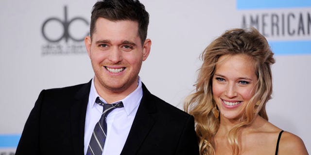 Nov. 21, 2010: This file photo shows Michael Buble, left, and Luisana Lopilato at the 38th Annual American Music Awards in Los Angeles.