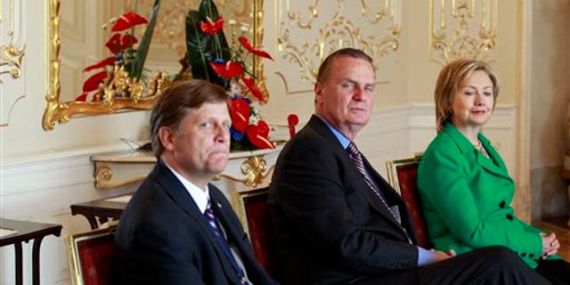 AP Photo; April 8, 2010; McFaul on left