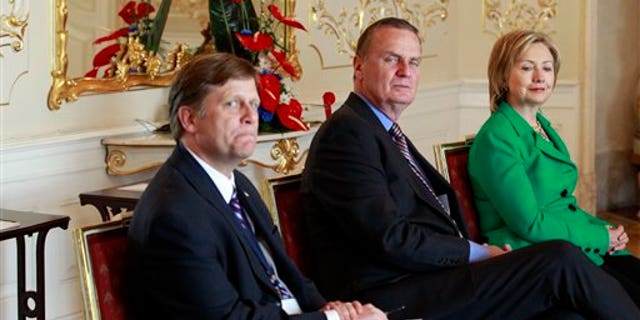 AP Photo; April 8, 2010; McFaul on left