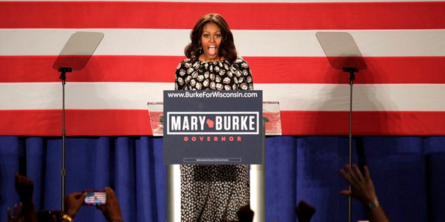 In this Sept. 29, 2014 photo, first lady Michelle Obama, speaks on behalf of Wisconsin Democratic gubernatorial candidate Mary Burke at a campaign rally in Milwaukee.