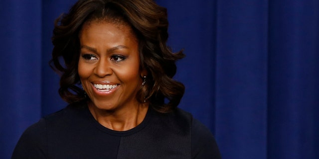 First lady Michelle Obama speaks in the Eisenhower Executive Office Building on the White House complex in Washington.