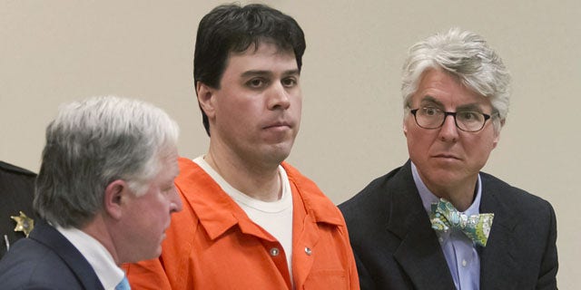 March 3, 2014: Raulie Casteel stands after sentencing in Livingston County, flanked by his attorneys Douglas Mullkoff, at left, and Charles Groh, in Howell, Mich. Casteel was sentenced to 18 to 40 years in prison on a combination of terrorism and weapons convictions. (AP Photo/Livingston County Daily Press &amp; Argus, Gillis Benedict, Pool)