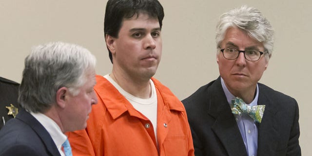 March 3, 2014: Raulie Casteel stands after sentencing in Livingston County, flanked by his attorneys Douglas Mullkoff, at left, and Charles Groh, in Howell, Mich. Casteel was sentenced to 18 to 40 years in prison on a combination of terrorism and weapons convictions. (AP Photo/Livingston County Daily Press & Argus, Gillis Benedict, Pool)
