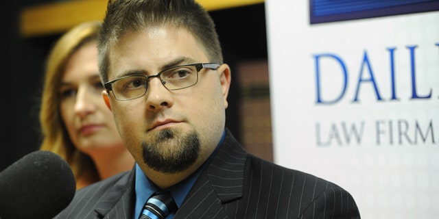 Aug. 17, 2015: Joshua Cline, former aide to Michigan state Reps. Todd Courser and Cindy Gamrat, talks about the scandal engulfing them during a news conference at Dailey Law Firm , P.C. in Royal Oak, Mich. (Brandy Baker / The Detroit News via AP)