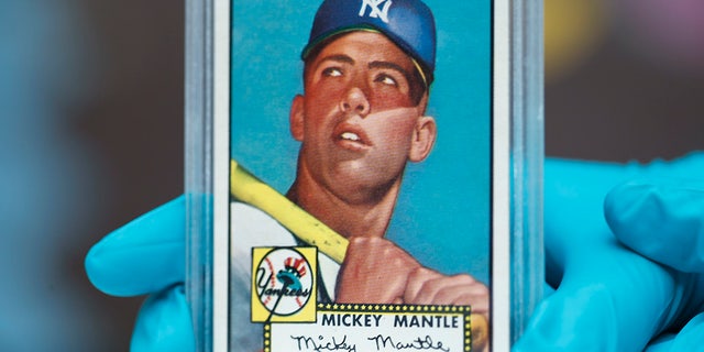 Two New Jersey brothers found five Mickey Mantle cards similar to this in their old collection.