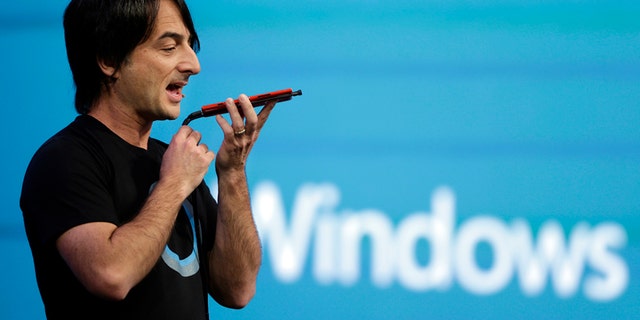 Microsoft corporate vice president Joe Belfiore, of the Operating Systems Group, demonstrates the new Cortana personal assistant during the keynote address of the Build Conference Wednesday, April 2, 2014, in San Francisco.