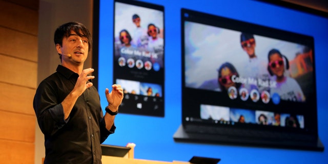 Joe Belfiore, Microsoft corporate vice president, Operating Systems Group, showcases the new Photos app for Windows 10 on Wednesday, Jan. 21, 2015.