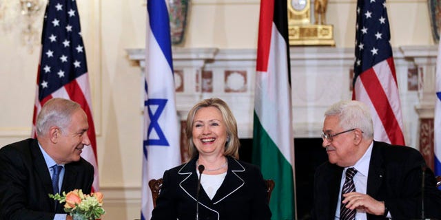 September 2: Israeli Prime Minister Benjamin Netanyahu, and Palestinian President Mahmoud Abbas, smile after an opening session of face-to-face peace talks hosted by Secretary of State Hillary Rodham Clinton at the State Department in Washington. (AP)