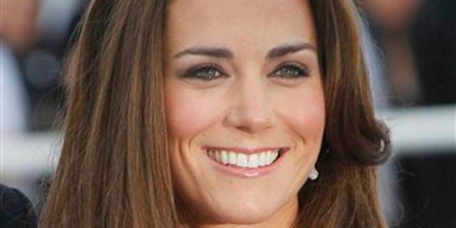 Kate, Duchess of Cambridge, wife of Prince William, arrives at a charity event for Absolute Return for Kids, ARK, in central London, Thursday, June, 9, 2011. The charity event is the first official engagement for the couple since they were married on April 29.(AP Photo/Alastair Grant)