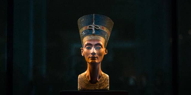 In this Sept. 10, 2014 file photo, a 3,300-year-old bust of Queen Nefertiti stands on its socle, at the New Museum in Berlin, Germany.