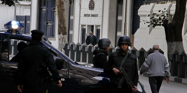 Dec. 8, 2014 - Security forces deployed in front of the British embassy in Cairo, Egypt, which closed to the public for the second day Monday, over security concerns. The Canadian Embassy also announced its closure Monday.