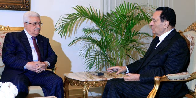 Dec. 9: Egyptian president Hosni Mubarak, right, meets with Palestinian authority president Mahmoud Abbas at the Presidential palace in Cairo, Egypt. Talks come within the framework of efforts aimed at reviving the Middle East peace process.