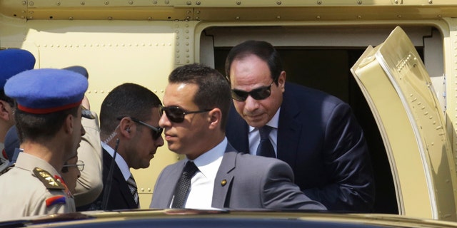 June 8, 2014 - Egyptian President-elect Abdel-Fattah el-Sissi gets out of a military helicopter as he arrives at the Supreme Constitutional Court, to take the oath of office in Cairo, Egypt.