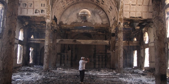 Aug. 15, 2013 - The damaged interior of the Saint Moussa Church after it was torched in sectarian violence following the dispersal of two Cairo sit-ins of supporters of the ousted Islamist President Mohammed Morsi, in Minya, south of Cairo, Egypt.