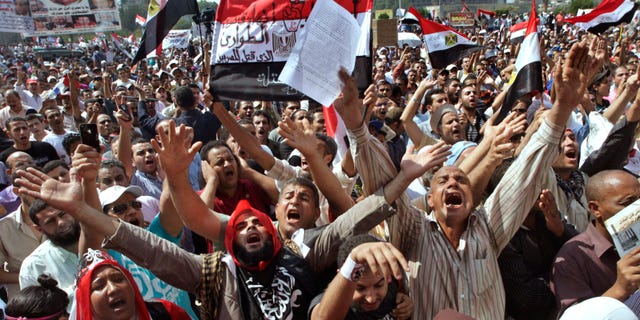 Several thousand Egyptians protesters shout against the country's military rulers at Tahrir Square, the focal point of Egyptian uprising, in Cairo, Egypt, Friday, Sept. 30, 2011. (Associated Press)