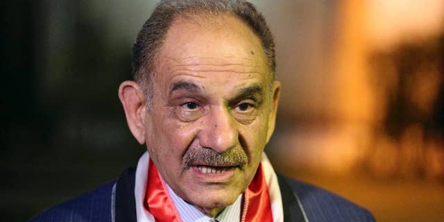 FILE- In this April 26, 2014 file photo, Iraqi Deputy Prime Minister Saleh al-Mutlaq talks with The Associated Press in Baghdad, Iraq. On Monday, Feb. 9, 2015, al-Mutlaq told The Associated Press on the sidelines of a conference in Dubai, that the U.S.-led coalition helping Iraq push back Islamic State group militants is not doing enough to match the scale of the threat, and he called for increased firepower to defeat the extremists. (AP Photo/Karim Kadim, File)