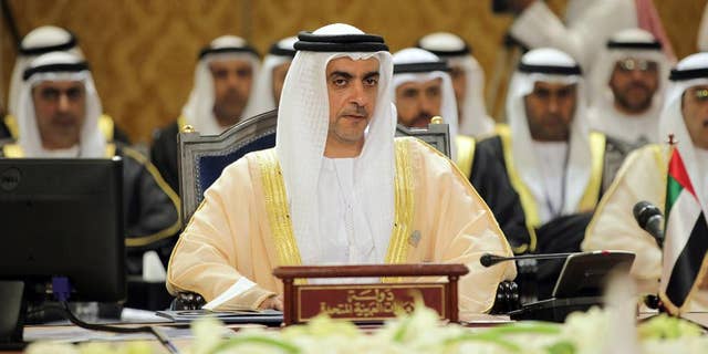 FILE - In this Thursday, Nov. 28, 2013 file photo, Emerati Interior Minister Sheik Saif bin Zayed Al Nahyan, center, participates in a Gulf Cooperation Council interior ministers gathering to discuss regional security issues in Manama, Bahrain. Omar al-Sinki, interior minister of Libya told The Associated Press ahead of his meeting Monday, Dec. 1, 2014 with Al Nahyan that he wants greater technical, logistical and political support from Arab and international allies. He declined to discuss details of whether members of the armed forces have received military equipment and arms from the UAE. (AP Photo/Hasan Jamali, File)