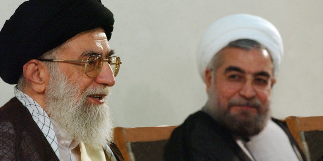 June 16, 2013 - Photo released by the official website of the Iranian supreme leader's office, supreme leader Ayatollah Ali Khamenei, left, speaks during his meeting with President-elect Hasan Rowhani in Tehran, Iran.