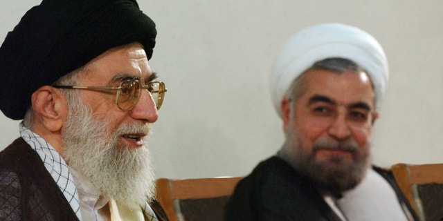 June 16, 2013 - Photo released by the official website of the Iranian supreme leader's office, supreme leader Ayatollah Ali Khamenei, left, speaks during his meeting with President-elect Hasan Rowhani in Tehran, Iran.