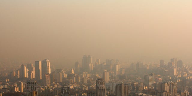 Dec. 1: Rooftops shrouded in polluted air in Tehran, Iran.