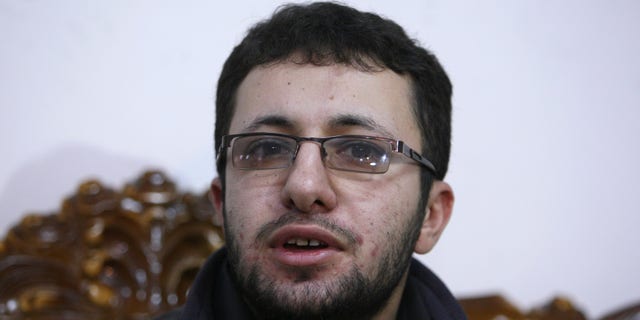 Iranian Sajjad Qaderzadeh, whose mother, Sakineh Mohammadi Ashtiani, has been sentenced to death by stoning for adultery, speaks with the media in a news briefing in the northwestern city of Tabriz, Iran, Saturday, Jan. 1, 2011. Ashtiani's sentence of death by stoning, which Iran has put on hold, has brought harsh condemnation from the U.S., the European Union and rights groups who are demanding Tehran stay the execution. It has further strained Iran's relations with world powers, already tense over the country's disputed nuclear program.