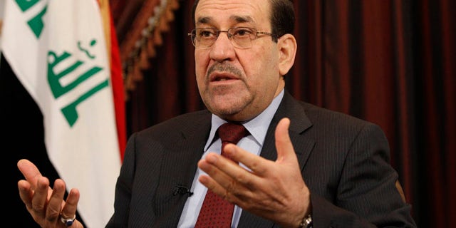 December 3, 2011: Iraq's Shiite Prime Minister Nouri al-Maliki is seen during an interview with The Associated Press in Baghdad. (AP Photo/Hadi Mizban, File)