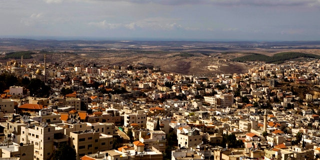 In this photo taken Sunday, Oct. 31, 2010, a general view of the northern Israeli town of Umm el-Fahm. Relations between Israel's dominant Jews and minority Arab citizens have never been cordial. But they now appear to be approaching a particularly low point, and activists warn violence could follow.