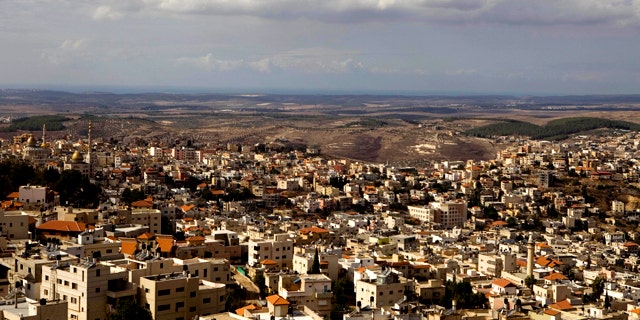 In this photo taken Sunday, Oct. 31, 2010, a general view of the northern Israeli town of Umm el-Fahm. Relations between Israel's dominant Jews and minority Arab citizens have never been cordial. But they now appear to be approaching a particularly low point, and activists warn violence could follow.