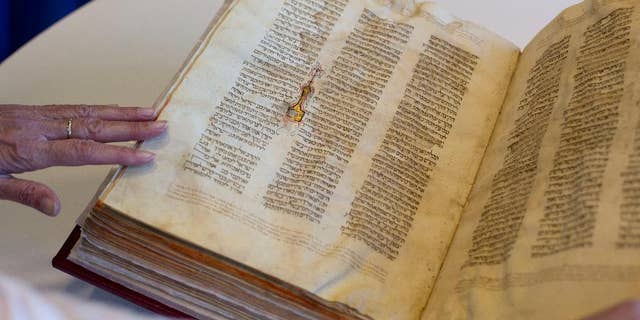 Ancient bibles, smuggled from Syria to Israel in spy mission, at center ...