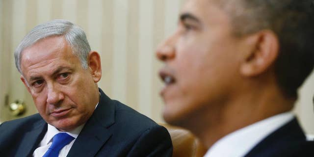 FILE - In this Sept. 30, 2013 file photo, President Barack Obama meets with Israeli Prime Minister Benjamin Netanyahu in the Oval Office at the White House in Washington. Despite Netanyahu's speech to Congress, his efforts to halt the Iranian nuclear program which he describes as the mission of his lifetime appear to be stumbling as the U.S. seems to move toward a deal with the Islamic Republic. (AP Photo/Charles Dharapak, File)