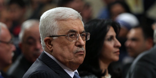 Dec. 25, 2012 - FILE photo of Palestinian President Mahmoud Abbas, attending Christmas Midnight Mass at Saint Catherine's Church in the West Bank town of Bethlehem.