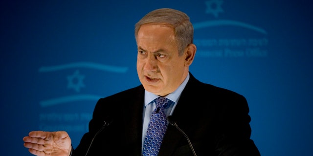 Jan. 11: Israeli Prime Minister Benjamin Netanyahu delivers a statement to members of the foreign press in Jerusalem. Netanyahu insists that Iran will not stop its nuclear program unless economic sanctions are backed with a 'credible military option.'