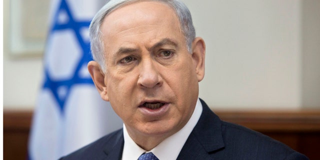 June 7, 2015: Israeli Prime Minister Benjamin Netanyahu attends the weekly cabinet meeting in his Jerusalem office.